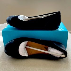 Brand new, never worn black flats